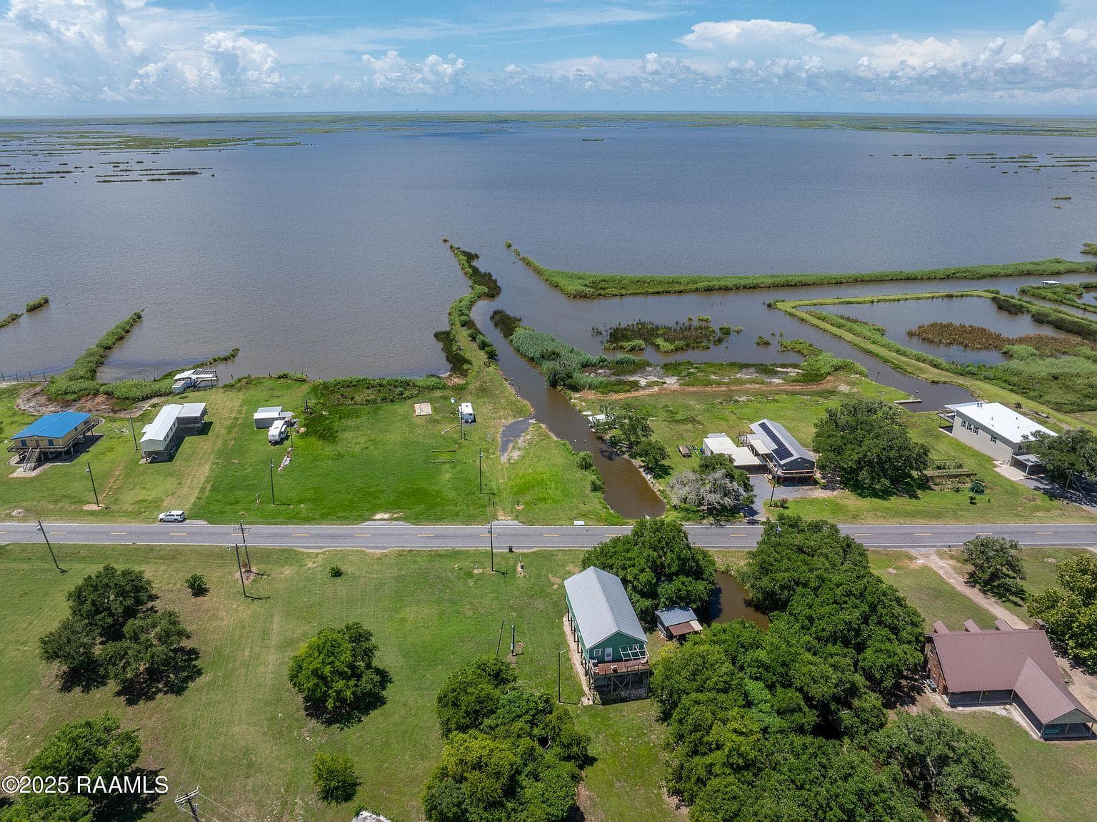 Waterfront aerial looking across the marsh