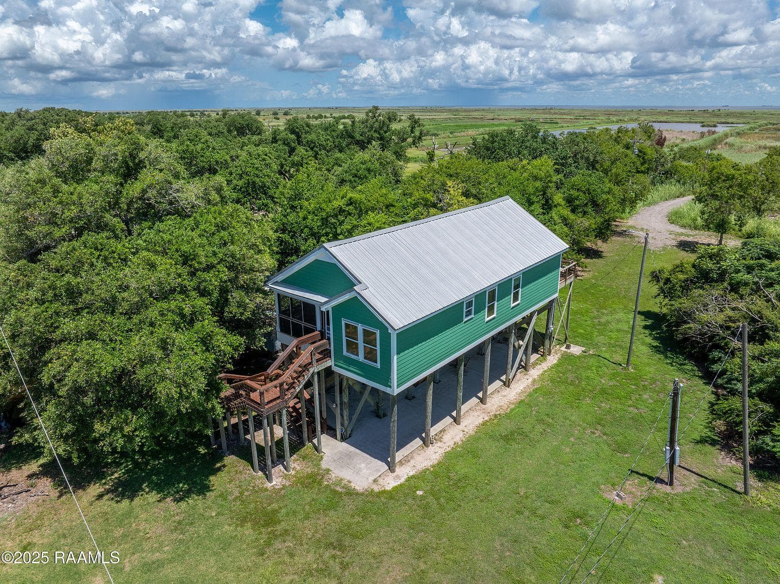 The camp's teal roof from above